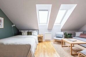 Queen size bed and convertible sofa bed allow to accommodate up to 4 people