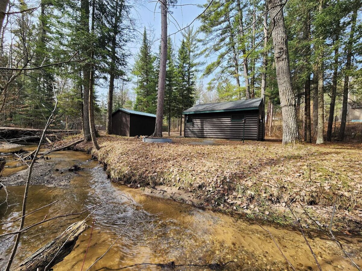 Cozy cabin with backyard stream close to Au Sable River and the best ATV trails