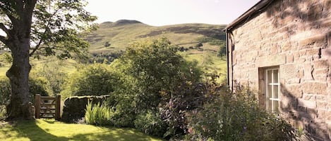 Steading Cottage garden with views into the Pentland Hills Regional Park