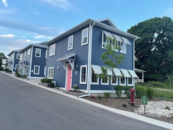 1st unit on the right, pink door Riverwalk Condos