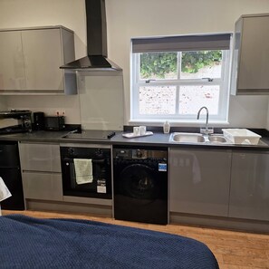 Fully fitted kitchen inside the studio