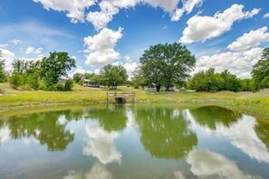 The view of the cabins from the other side of the fishing pond