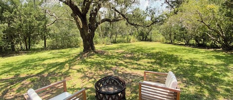 Spacious, fenced in backyard on tidal creek. 