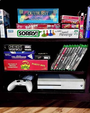 XBOX S with games and board games to keep the kids entertained