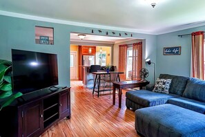 The Living Room  with a brand new plush couch and 55" 4K HDTV