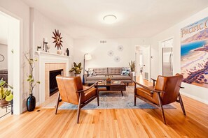 This first living room with its mid-century modern flare is perfect for enjoying a glass of your favorite beverage and conversation after an activity-packed day.