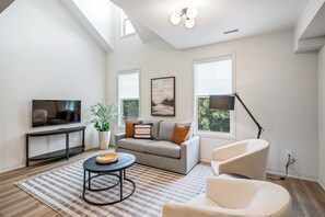 Open concept living, dining and kitchen area