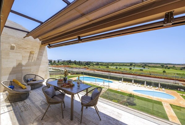 South-Facing Terrace Dining & Seating Area with Views