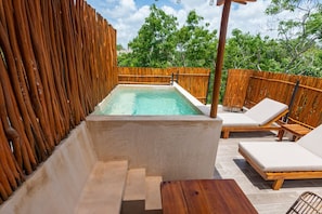 Relax by the sunlit private pool, where every moment is full of warmth.