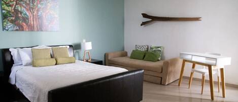 The master bedroom is very spacious and bright, and decorated with modern and comfortable furniture