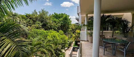 Here you can appreciate the lush nature as you look outside and right in front of the terrace. The amazing thing about this property is it very central location and its totally peaceful feeling.