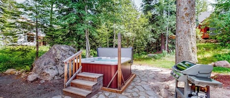 Hot tub surrounded by the pines and aspens