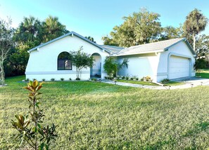 Front of Coastal Beacon large spacious front/side and back yard.