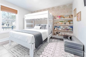 The 3rd bedroom offers a queen & twin loft bed. Kids will love the reading nook 