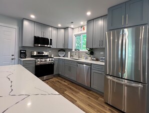 Fully stocked kitchen has everything you need.