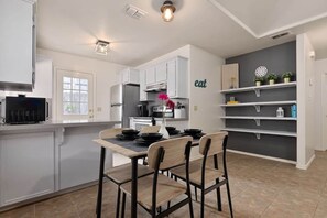 Spacious dining room space to enjoy your home cooked meals.
