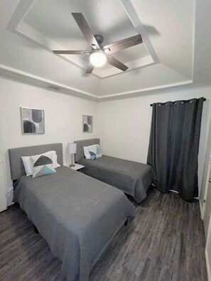 Cozy and comfortable twin beds with everything you need to enjoy your stay.