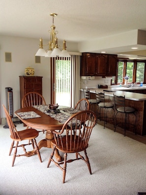 Dining room seats 9 comfortably.