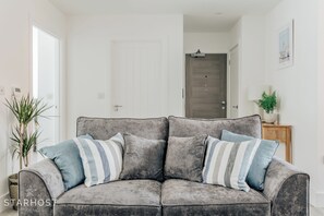 This inviting sofa is just waiting for you to sink into