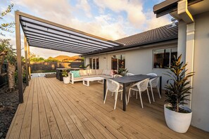 Expansive deck area for outdoor entertaining.