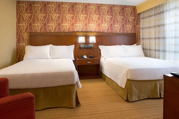 Unit with 2 Double beds. Exact unit will be assigned upon arrival. Views, colors, and decor may vary.