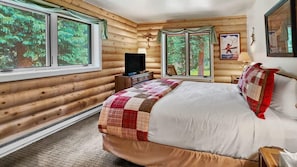 Get a good night’s rest in the main level bedroom and wake up to views over the surrounding trees.
