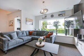 Open livingroom with garden view