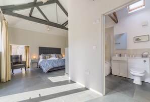 Bright and airy bedroom one, with an en-suite bathroom