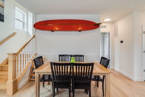 1960's surfboard above dining table