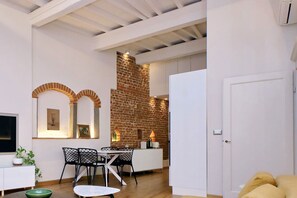 Open-plan living room, dining room and kitchen.