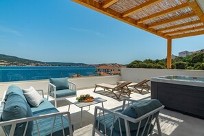 outdoor dining area with a barbecue