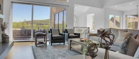 Vacation rental living room with views of the mountain.