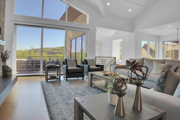 Vacation rental living room with views of the mountain.