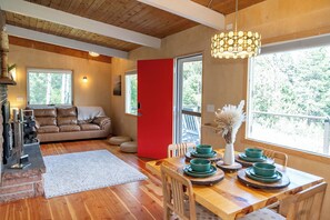 The cabin features a rustic yet comfortable interior.