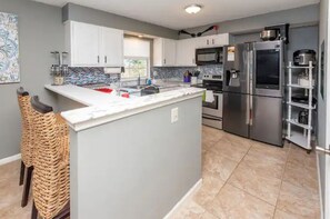 - Fully stocked kitchen with Smart appliances 