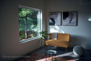 Sitting area in the studio with the loveseat! Sip your morning coffee!