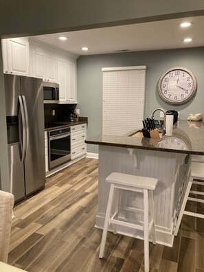 Kitchen with all New Stainless Appliances & Granite Countertops