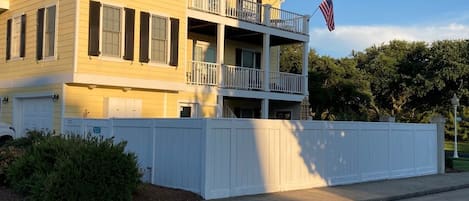 Side Entrance with Enclosed Patio Area and Porches