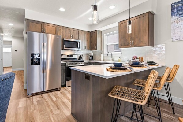 Enjoy your favorite people + meals in the eat-in kitchen!