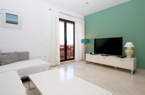 Modern lounge with air-conditioning, comfortable seating and FlatScreen TV (Sky Channels)