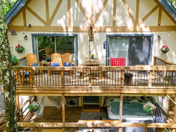 Back porches with seating and hot tub