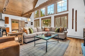 Gather around the fire on the comfortable and spacious couch!