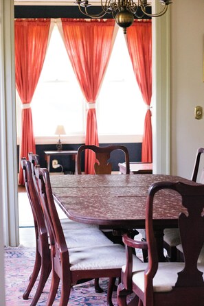 Gather the family around the table for a meal with seating for 8