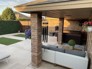 Outdoor Living Area with Hot Tub and TV