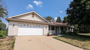 garage with garage door auto open door