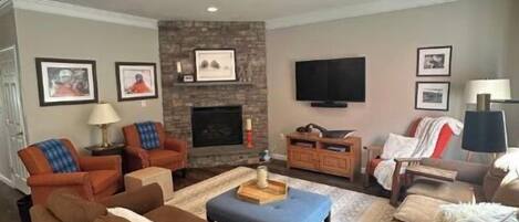 Main floor living room with gas fireplace