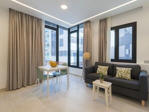 Living-dining room with sea views