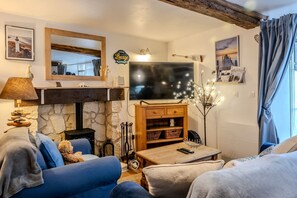 Espace détente, canapé et fauteuil très confortable.