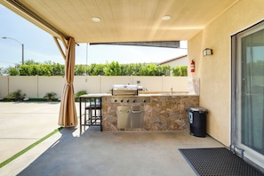 Covered Patio | Bar Area w/ Gas Grill | Close to Golf Courses