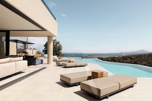 A private, 60 sq.m., free shape swimming pool, 1,40 m. deep with step access